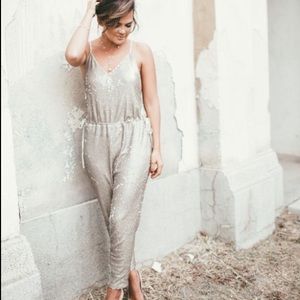 FREE PEOPLE GOLD SEQUIN DRAWSTRING JUMPSUIT NWOT L